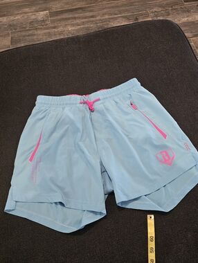 Men's Light Blue Athletic Shorts with Pink Accents